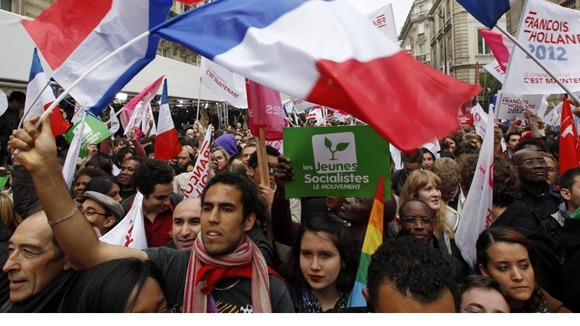 Supporters of President Francois Holland celebrate his victory