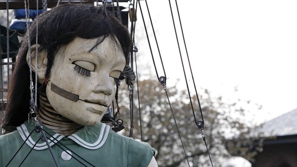 The Little Girl Giant, a giant marionette created by experts Royal De Luxe.