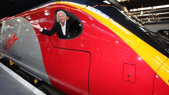 A union has accused Sir Richard Branson of sourcing train uniforms from 'Del Boy' Trotter