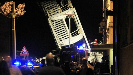 A part of the collapsed control tower is pictured at the Genoa's port harbour 