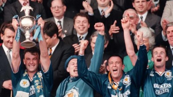 Leicester City captain Steve Walsh, with cup, celebrates their 2-1 win over Crystal Palace at Wembley