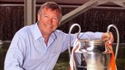 Sir Alex Ferguson with a trophy