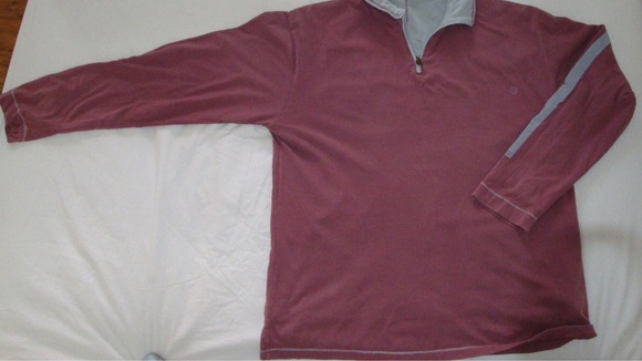 Replica sweatshirt worn by Luke on the evening he went missing, the top is reversible
