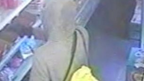 The second wore a grey tracksuit and was carrying a florescent drawstring bag