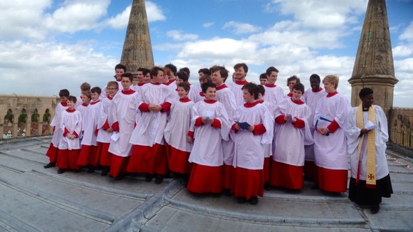 Choir performs Ascension Day carol at the top of the tower