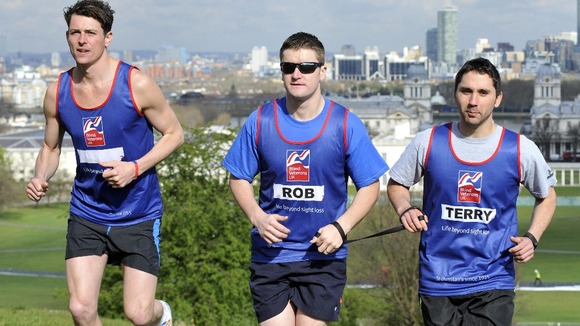 Lance Bombardier Rob Long (centre) with actor Lachlan Nieboer (left) and Rob's sighted guide Lance Cpl Terry Desmond (right)
