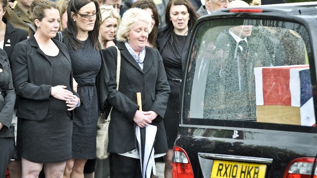 Mourners, family and friends including Lyndsey Savage