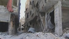 Deserted bomb-damaged streets of Syrian capital Damascus