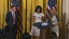 Prince Harry meets First Lady Michelle Obama as he begins his trip to the US.