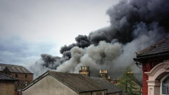 Smoke rises after the reported explosions in Belper, Derbyshire