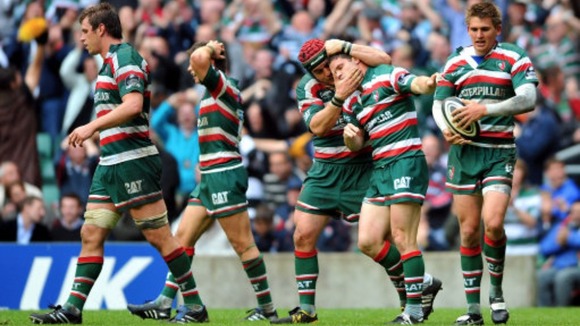 Leicester Tigers' Dan Hipkiss (second right) is mobbed by his team mates after scoring the winning try