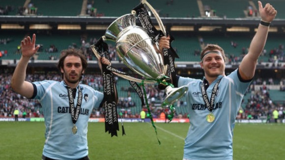 Leicester Tiger's Julien Dupuy (left) and Benjamin Kayser celebrate with the Guinness Premiership Trophy