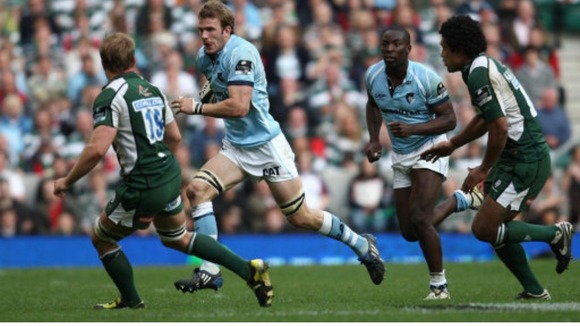 Leicester Tigers Tom Croft takes on London Irish's Richard Thorpe