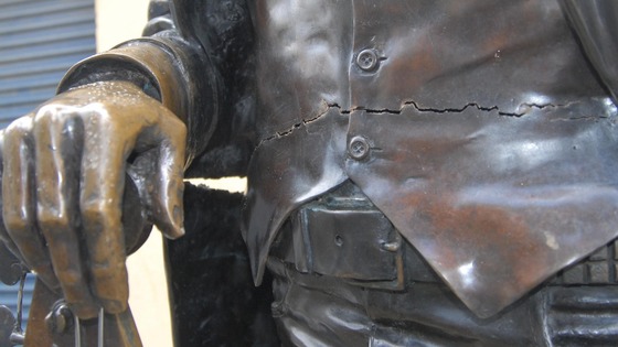 The statue was almost split in half when it was pushed over