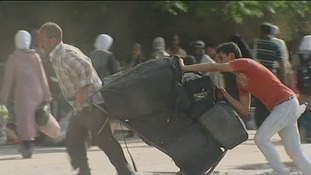 Locals in the Yarmouk district of the Syrian capital Damascus are pacing their bags and leaving.