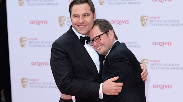 David Walliams and Alan Carr cuddle up on the red carpet
