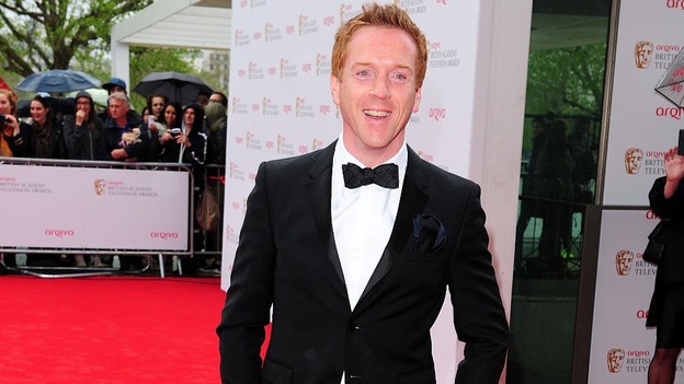 Damian Lewis smiles for the cameras at the BAFTAs