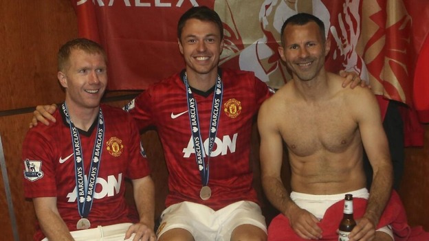 Paul Scholes, Jonny Evans and Ryan Giggs celebrate their victory