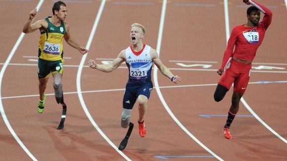 Great Britain's Jonnie Peacock wins the Men's 100m - T44 Final, during the Paralympic Games