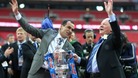 Martinez celebrates with chairman Dave Whelan and the FA Cup trophy, after their victory over Manchester City