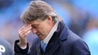 Roberto Mancini was celebrating Premier League glory less than a year ago