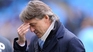 Roberto Mancini was celebrating Premier League glory less than a year ago