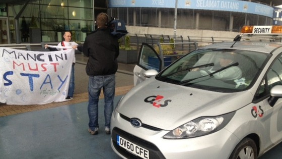 Fans protest outside the Ethiad Stadium