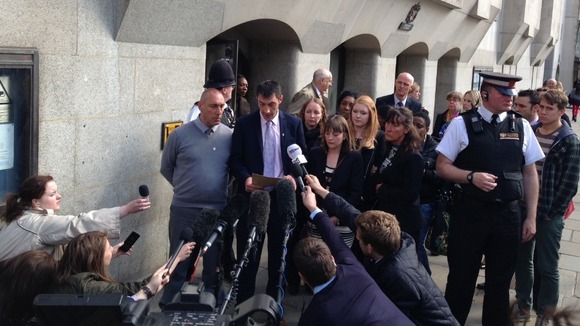 Tia Sharp's father, Steven Carter, reads a statement to reporters outside the Old Bailey