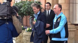 Mancini leaving the team hotel in London this morning