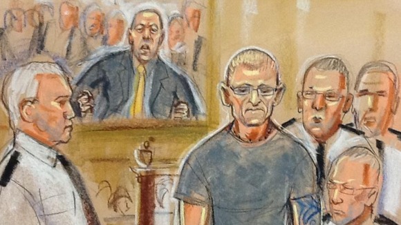 Stuart Hazell surrounded by guards at the Old Bailey