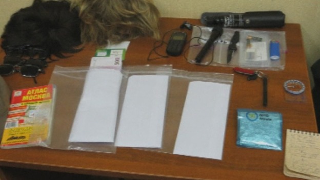 Objects - including wigs, dark sunglasses and a wad of 500-euro notes - claimed to be Ryan Fogle's possessions