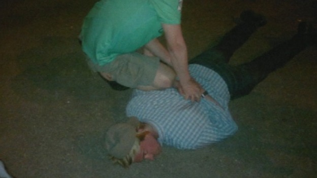 Ryan Fogle being handcuffed by Russian police