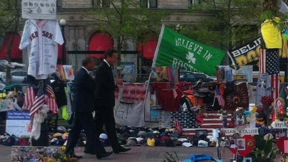 The Prime Minister walks by the site of the bombings with Governor Deval Patrick.