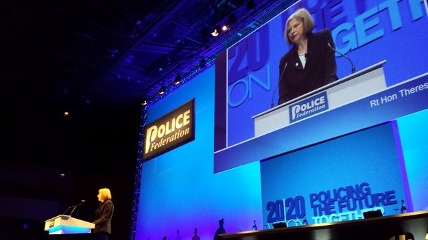 Theresa May addresses the conference