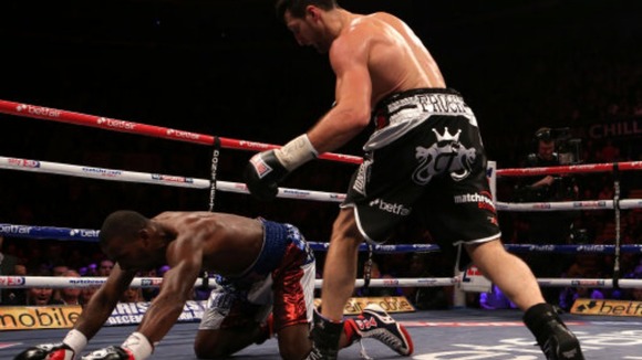 Carl Froch (right) knocks down Yusaf Mack during the IBF World Super Middleweight Title fight at the Capital FM Arena, Nottingham.