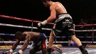 Carl Froch (right) knocks down Yusaf Mack during the IBF World Super Middleweight Title fight at the Capital FM Arena, Nottingham.