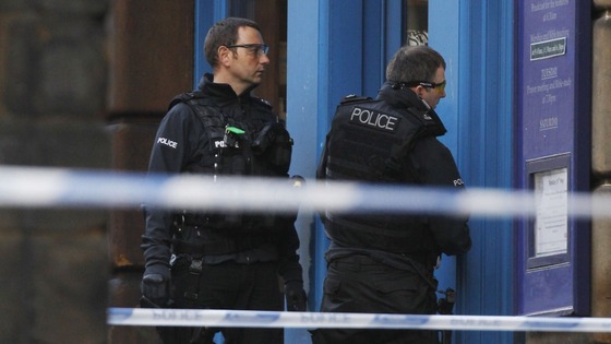 Police at the scene of the incident on the Royal Mile in Edinburgh.