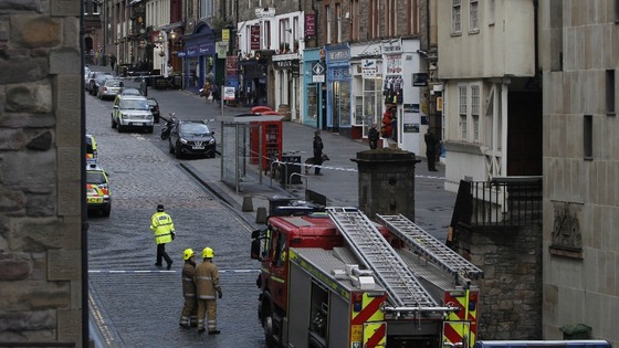 Police and firefighters at the scene of an incident on the Royal Mile in Edinburgh 