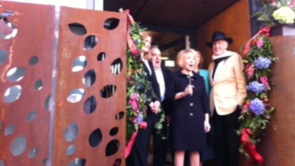 Charles Jencks, husband of Maggie, cuts the ribbon to officially open the centre.
