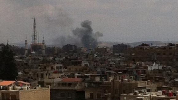 More black smoke from shelling of targets in Damascus.