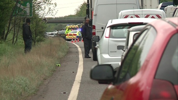 Police on the scene of A45 accident involving car and motorbike