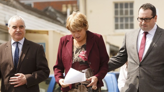 Laura McManus, the mother of Chris McManus prepares to read her statement