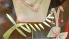 A model of the Golden Palm, made by Swiss jeweller Chopard, is seen in the window of a luxury jeweller in Cannes.