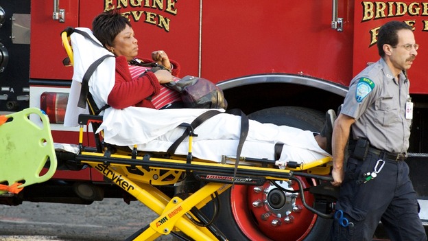 A woman is transported to the hospital