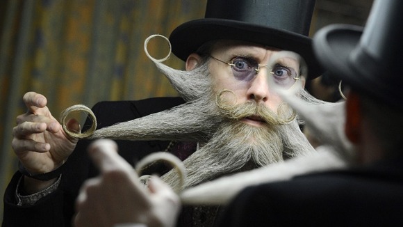 United States' Aarne Bielefeldt dresses his beard.
