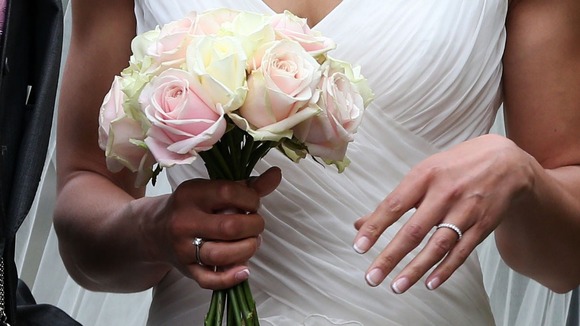 Jessica Ennis shows off her wedding ring and bouquet