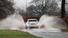 car and spray on roads