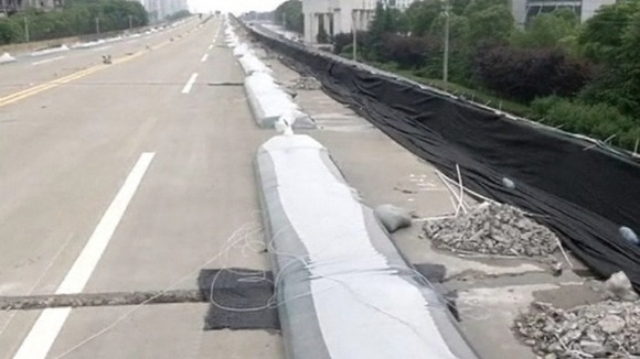 Bags containing water line the full 2.2 miles of the viaduct