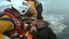 Dog walker in mud rescue
