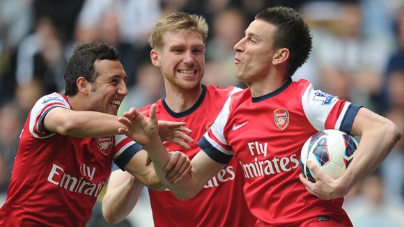 Arsenal Laurent Koscielny (right) celebrates scoring the opening goal.